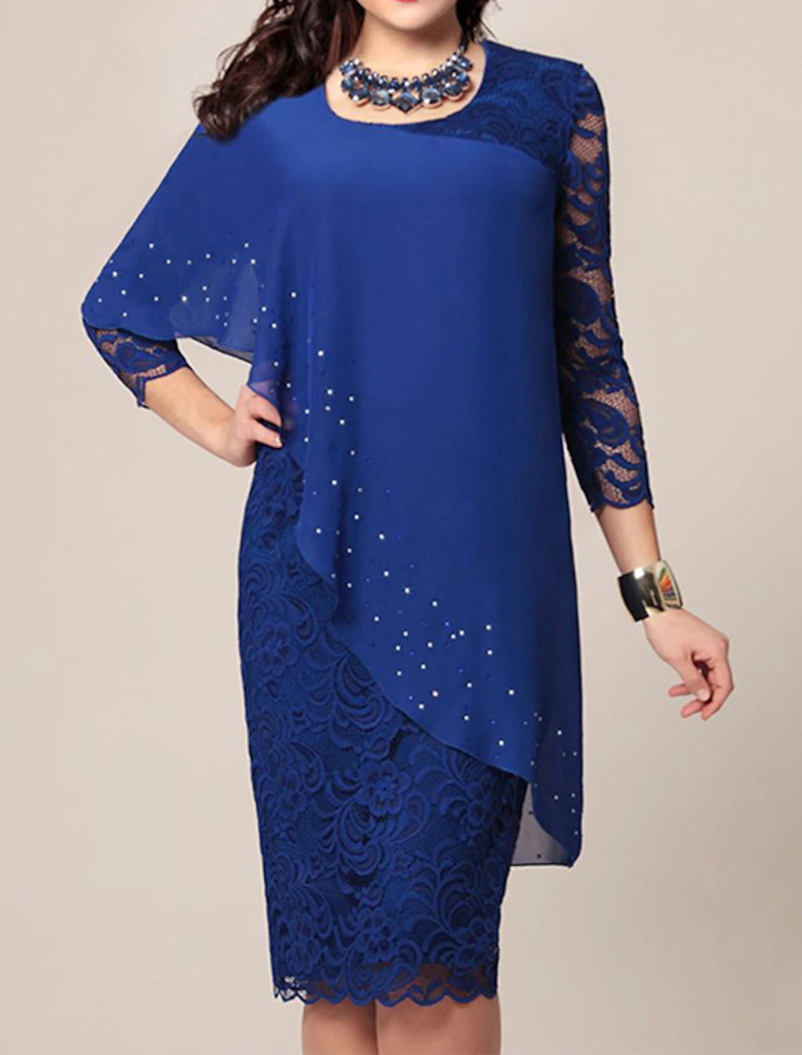 Close-up of lace detail on 3/4 sleeve of Mother of the Bride dress.