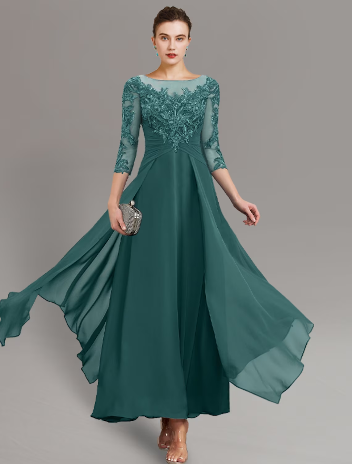 Model showcasing the back of the formal wedding guest gown.