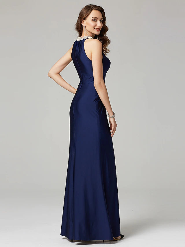 Elegant sheath dress with jewel neck and floor length silhouette.
