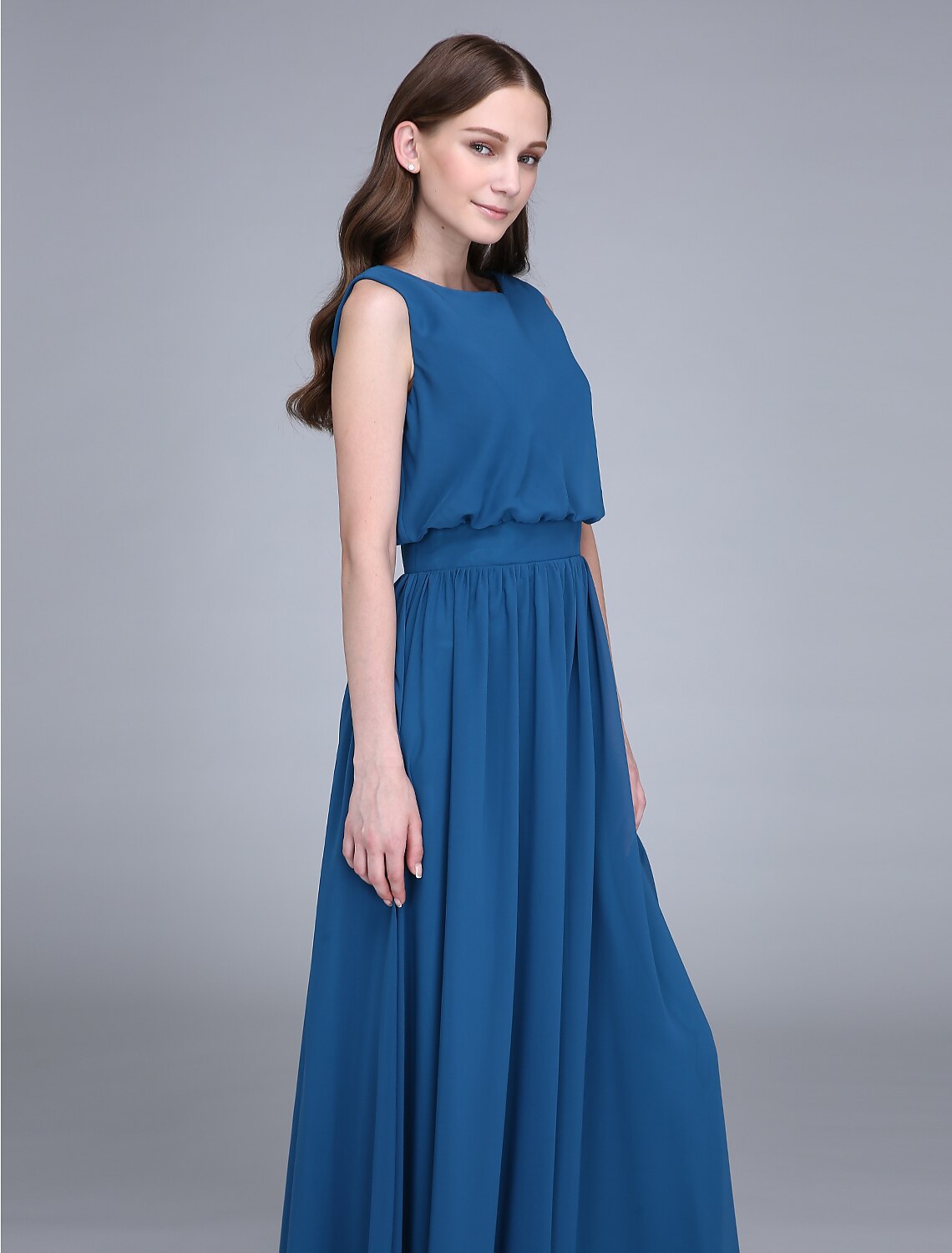 Model wearing a floor-length jewel neck bridesmaid dress.