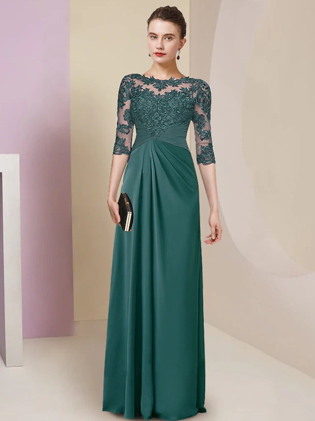 Elegant sheath Mother of the Bride gown with jewel neck and half sleeves.