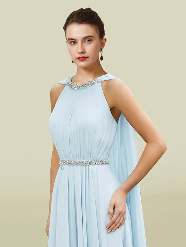 Back view of Jewel Neck Tea Length Dress with crystal brooch.
