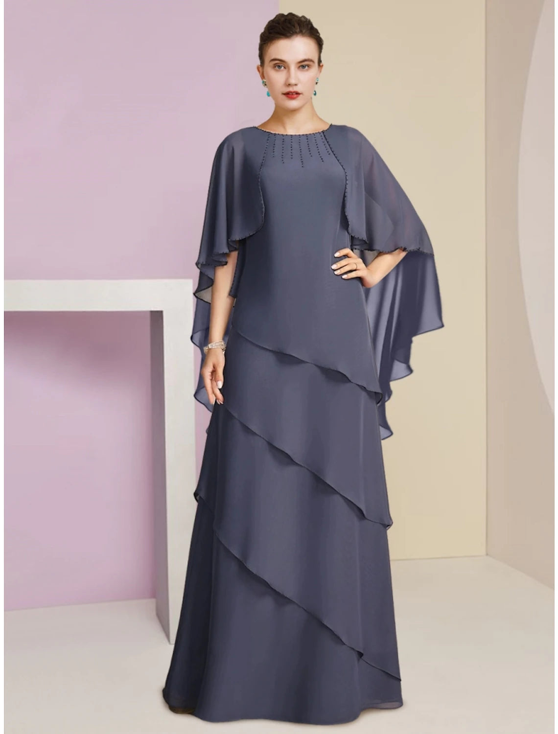 Elegant sheath mother of the bride dress with jewel neck and half sleeves.