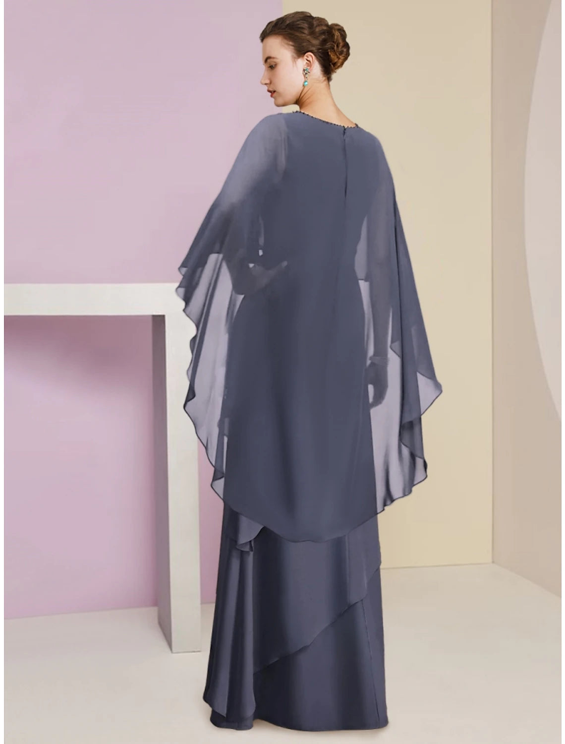 Back view of the floor-length chiffon dress with sequin tier.
