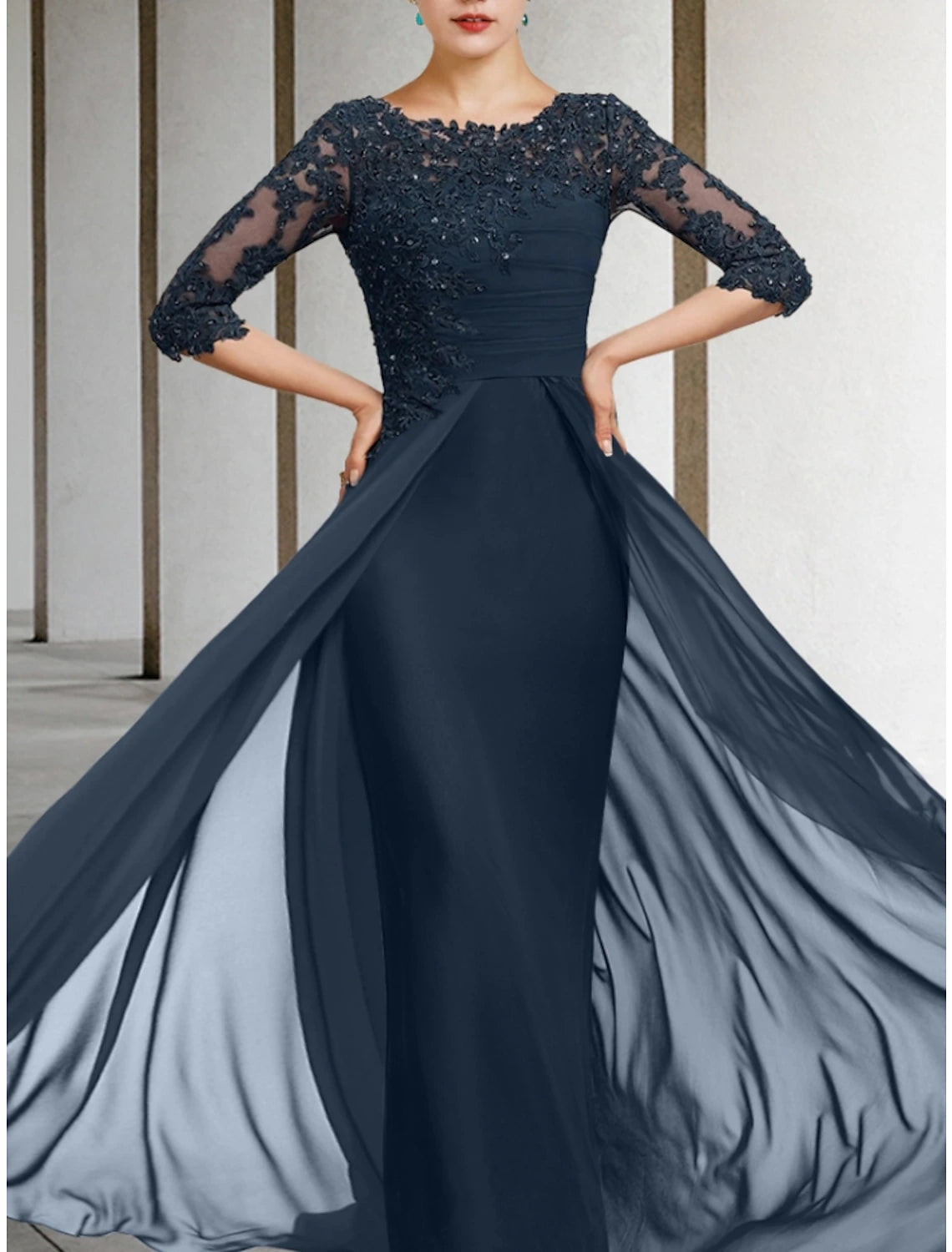 Close-up of sequin and lace detail on the half sleeve of the dress.