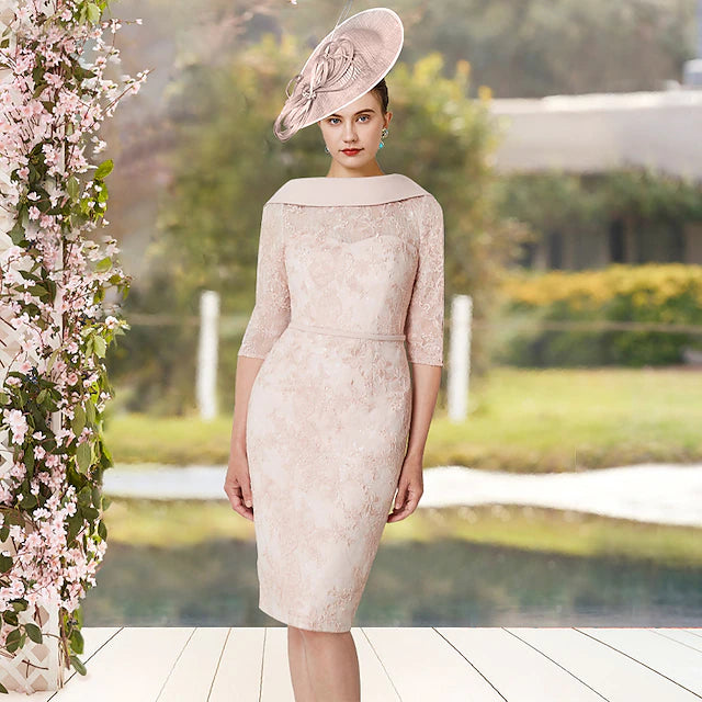 Elegant Sheath Mother of the Bride dress with jewel neck and half sleeves.