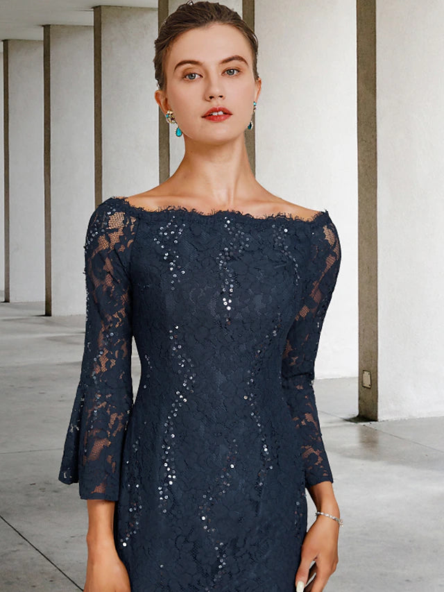 Close-up of the sequin and lace embellishments on the tea length Mother of the Bride dress.