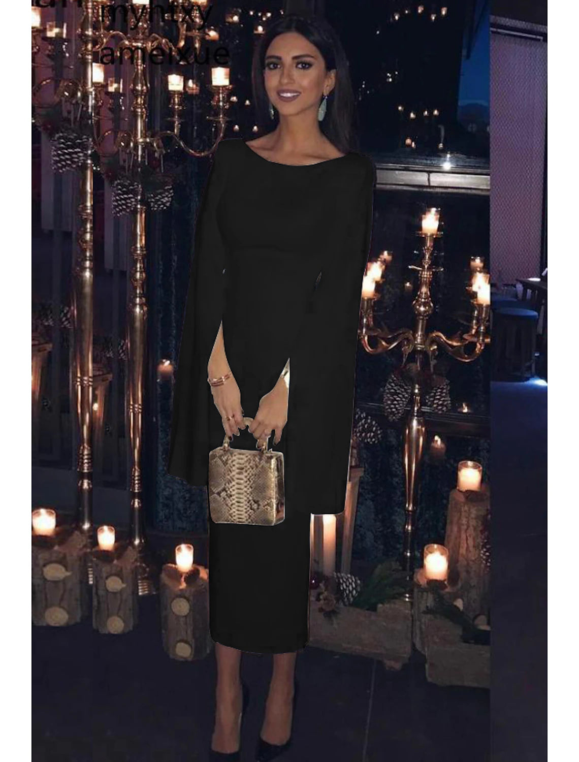 Elegant sheath tea-length dress with long sleeves and jewel neck.