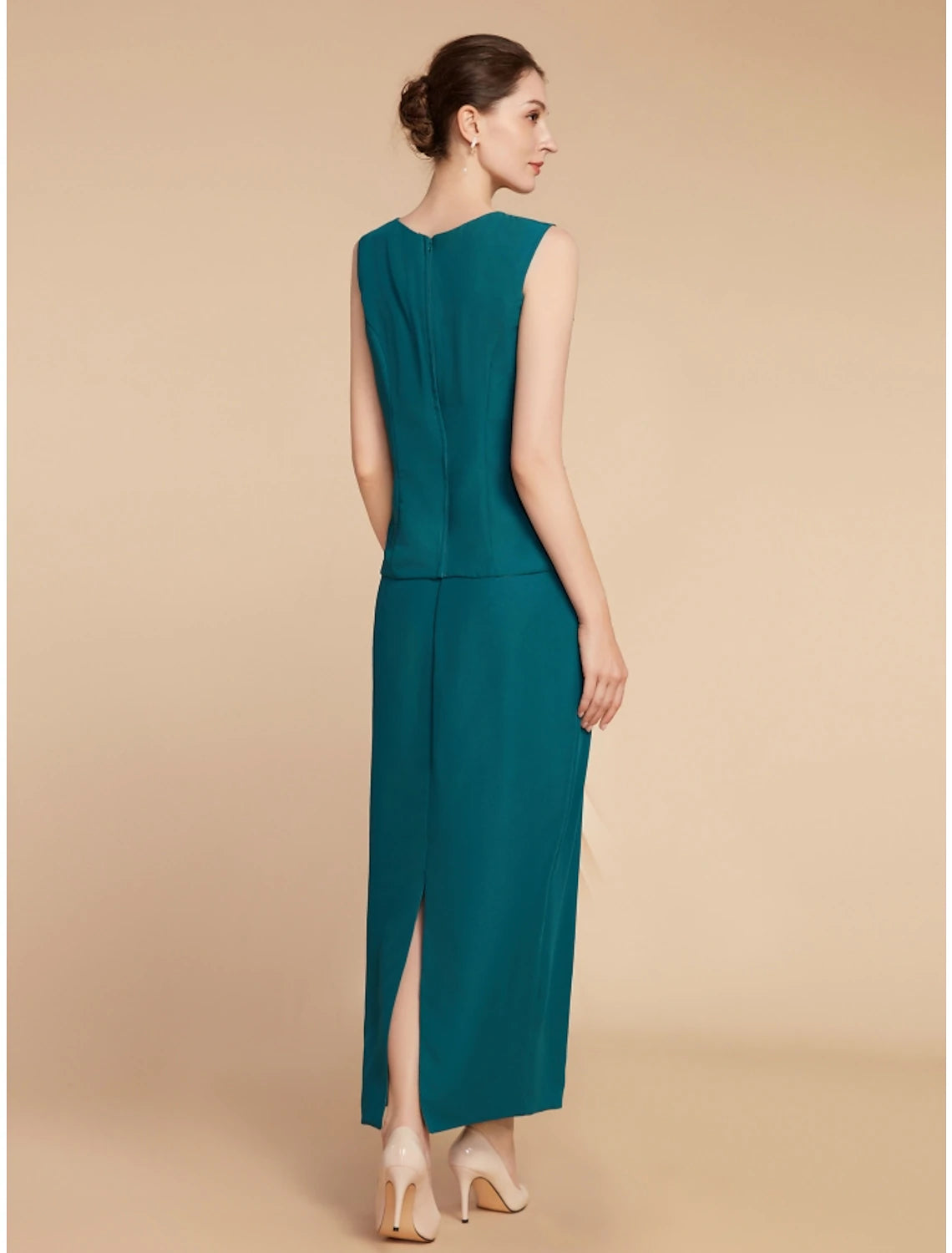 Close-up of the jewel neckline and chiffon fabric detail.