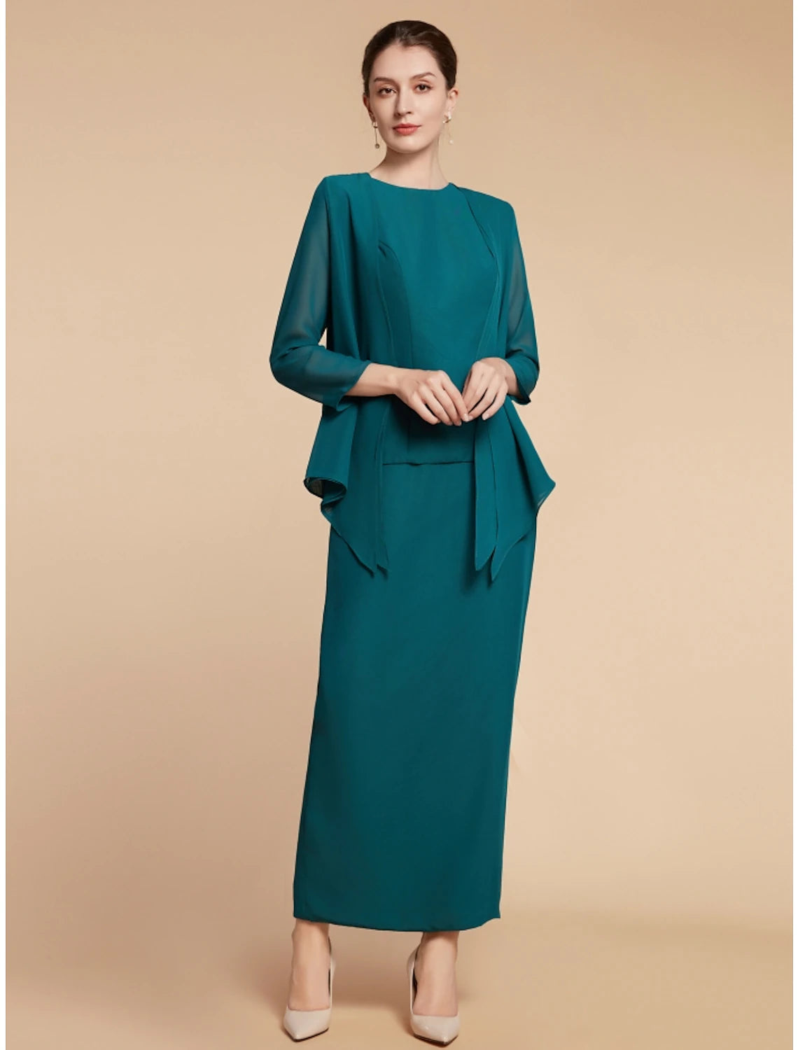 Detail of the split front and ruching on the elegant ankle-length dress.