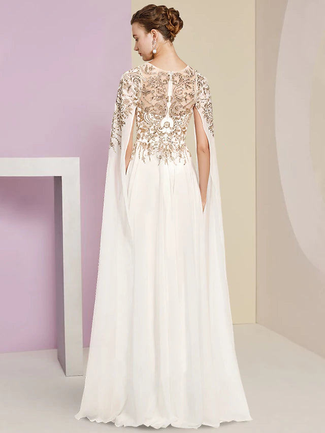 Detail of the long sleeve and sequined lace on the formal dress.