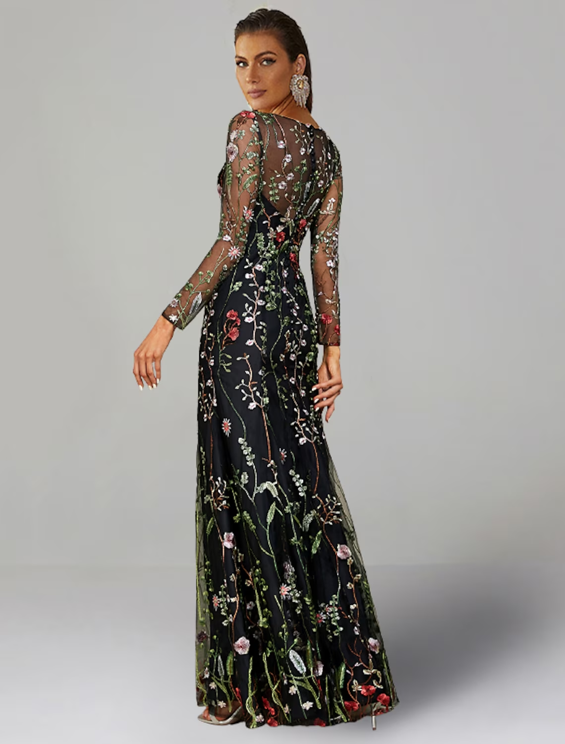 Full view of the floral embroidered tulle sheath dress with long sleeves and jewel neckline.