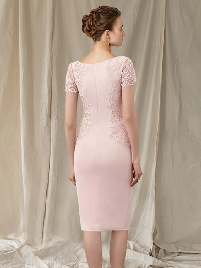 Back view of an elegant knee-length mother of the bride dress.
