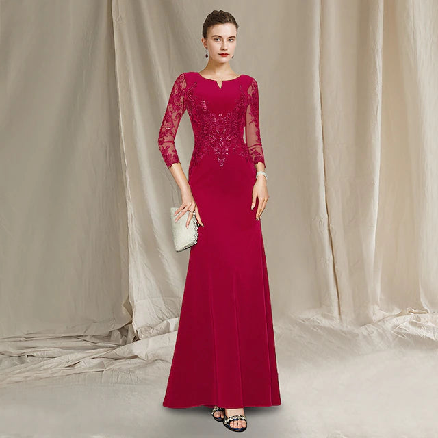 Elegant sheath Mother of the Bride dress with jewel neck and short sleeves.