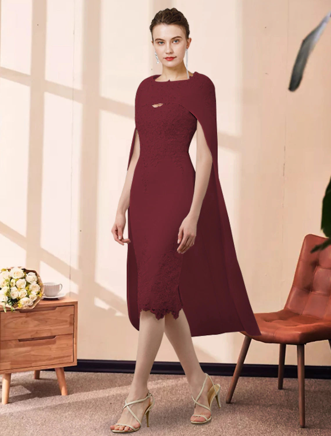 Detail of the jewel neckline and sleeveless design.