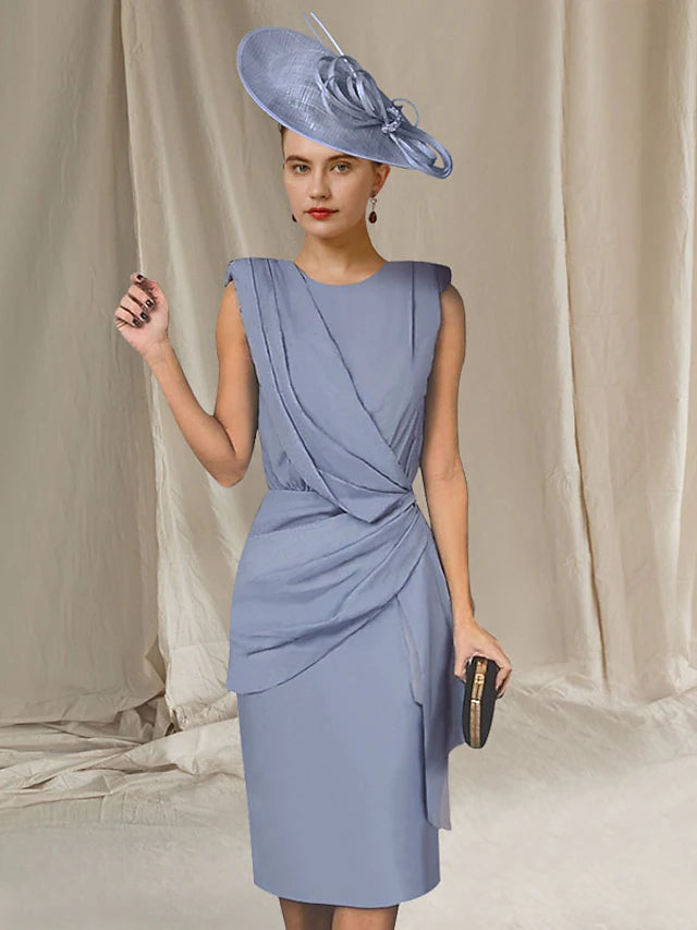 Elegant sheath Mother of the Bride dress with jewel neck and ruffles.