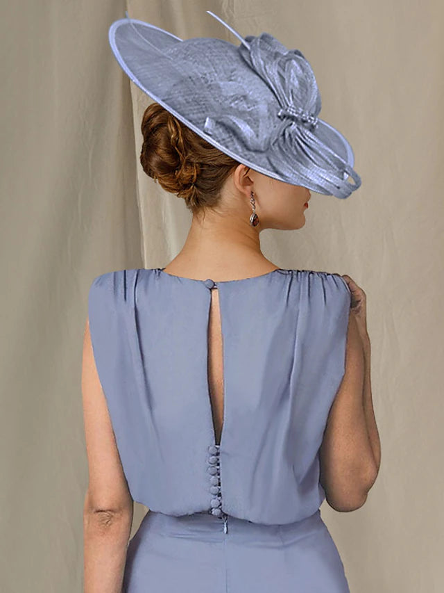 Knee-length sheath dress for Mother of the Bride, featuring a sleeveless design.