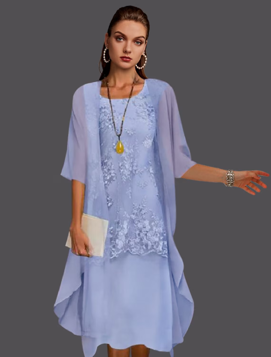 Elegant two-piece mother of the bride dress with jewel neck and lace jacket.