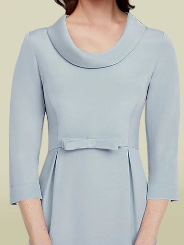 Side view of the tea length mother of the bride dress with 3/4 sleeves.