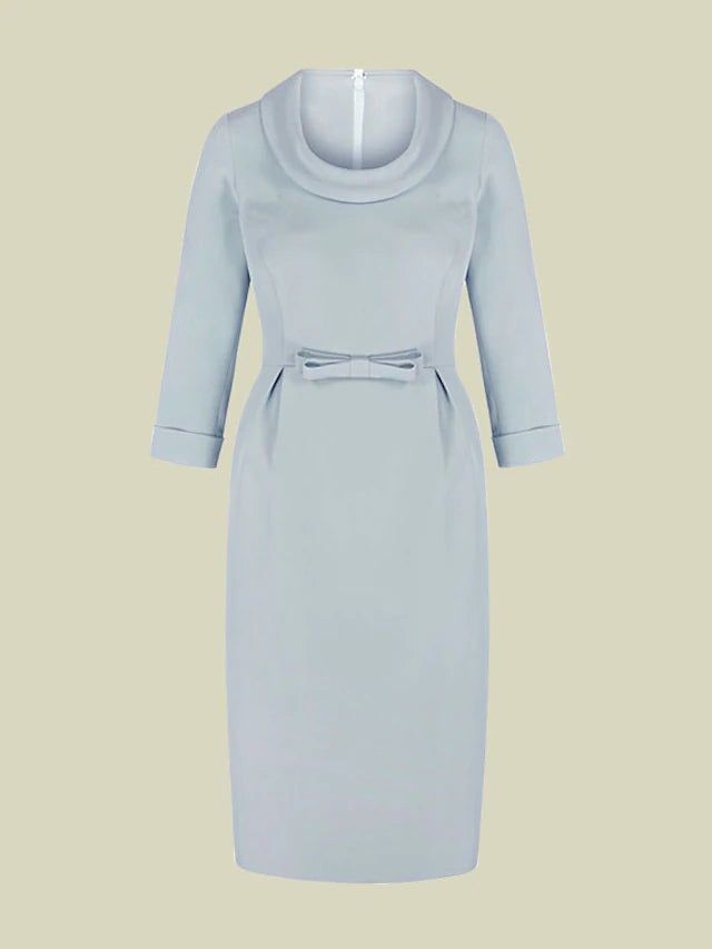 Close-up of the jewel neck and 3/4 sleeves on the elegant dress.