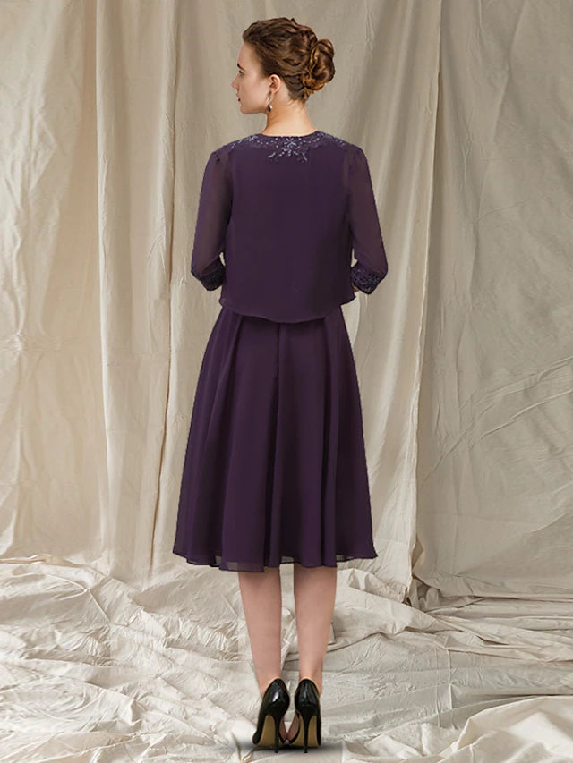 Back view of the knee-length two-piece mother of the bride dress.