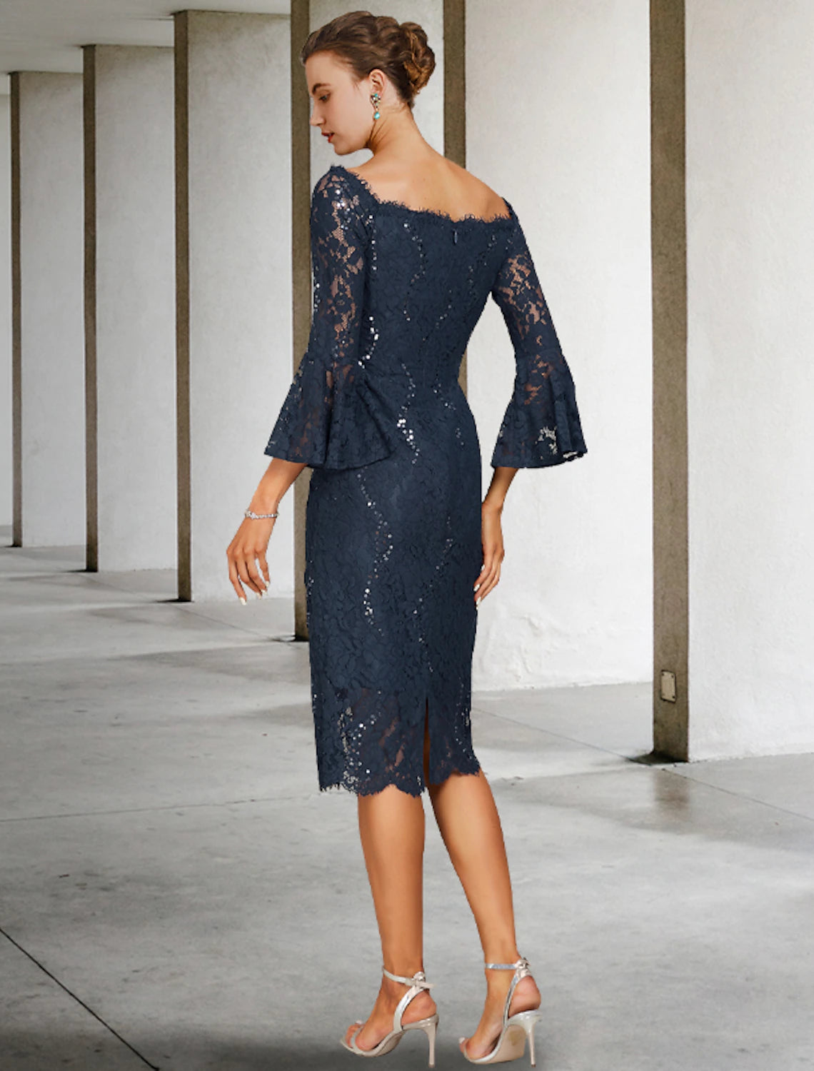 Close-up of lace and sequin details on a 3/4 sleeve Mother of the Bride dress.