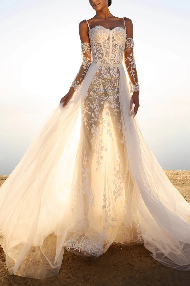 Front view of an elegant sheath lace sleeveless wedding dress.