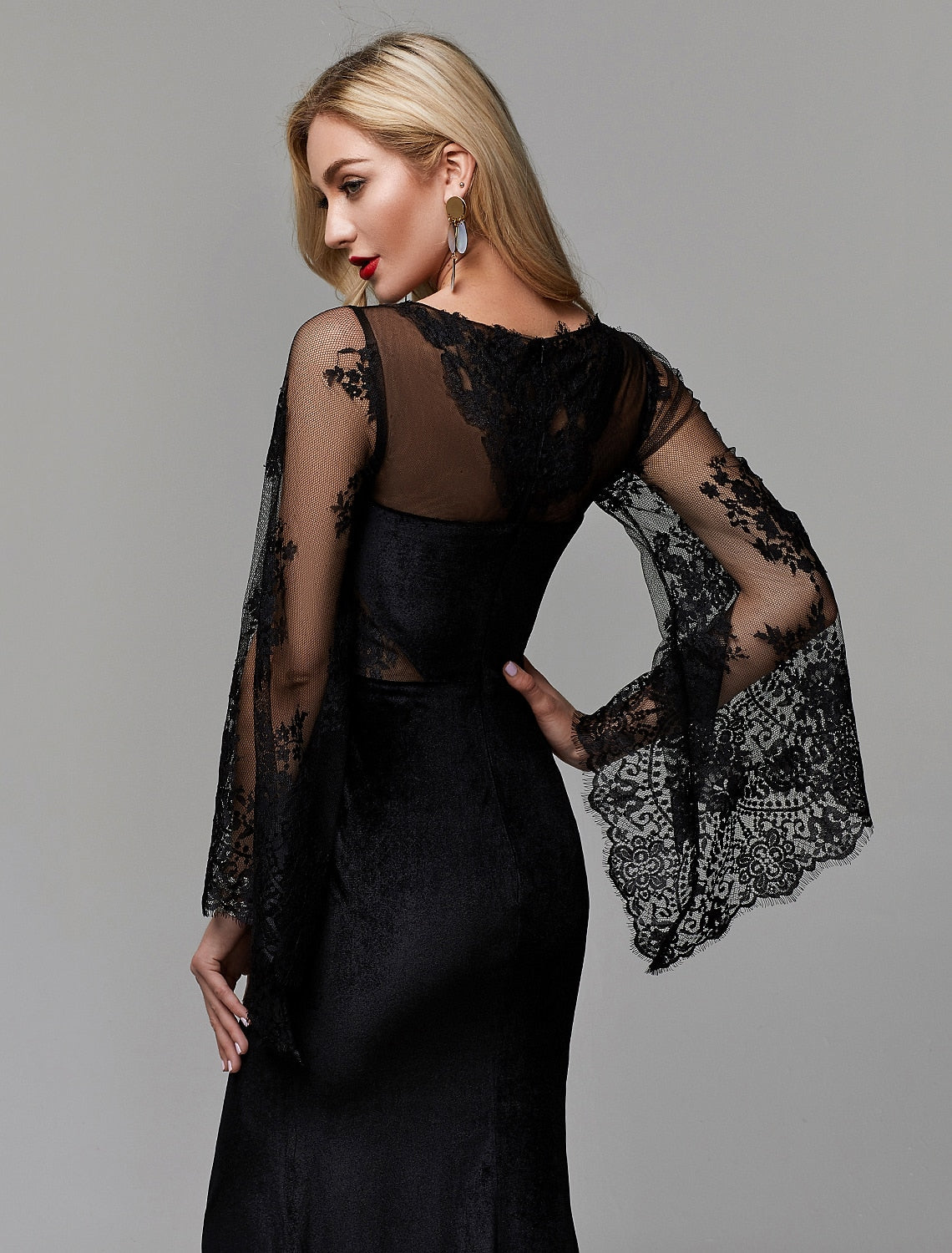 Full-length view of the elegant formal dress with a subtle train.