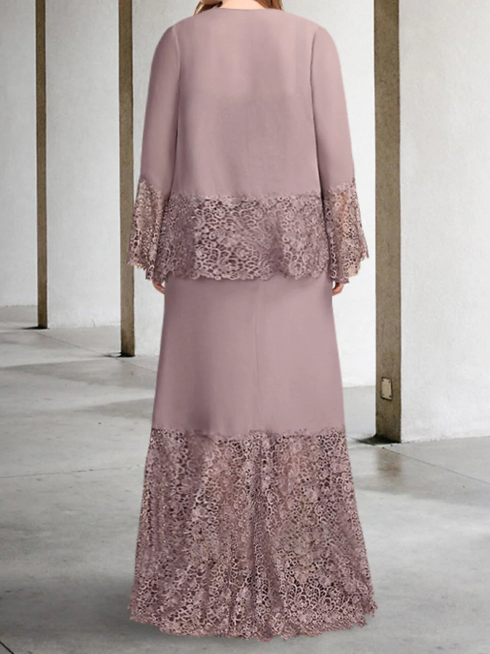Close-up of the elegant sleeveless sheath mother of the bride dress, showing its sleek silhouette.
