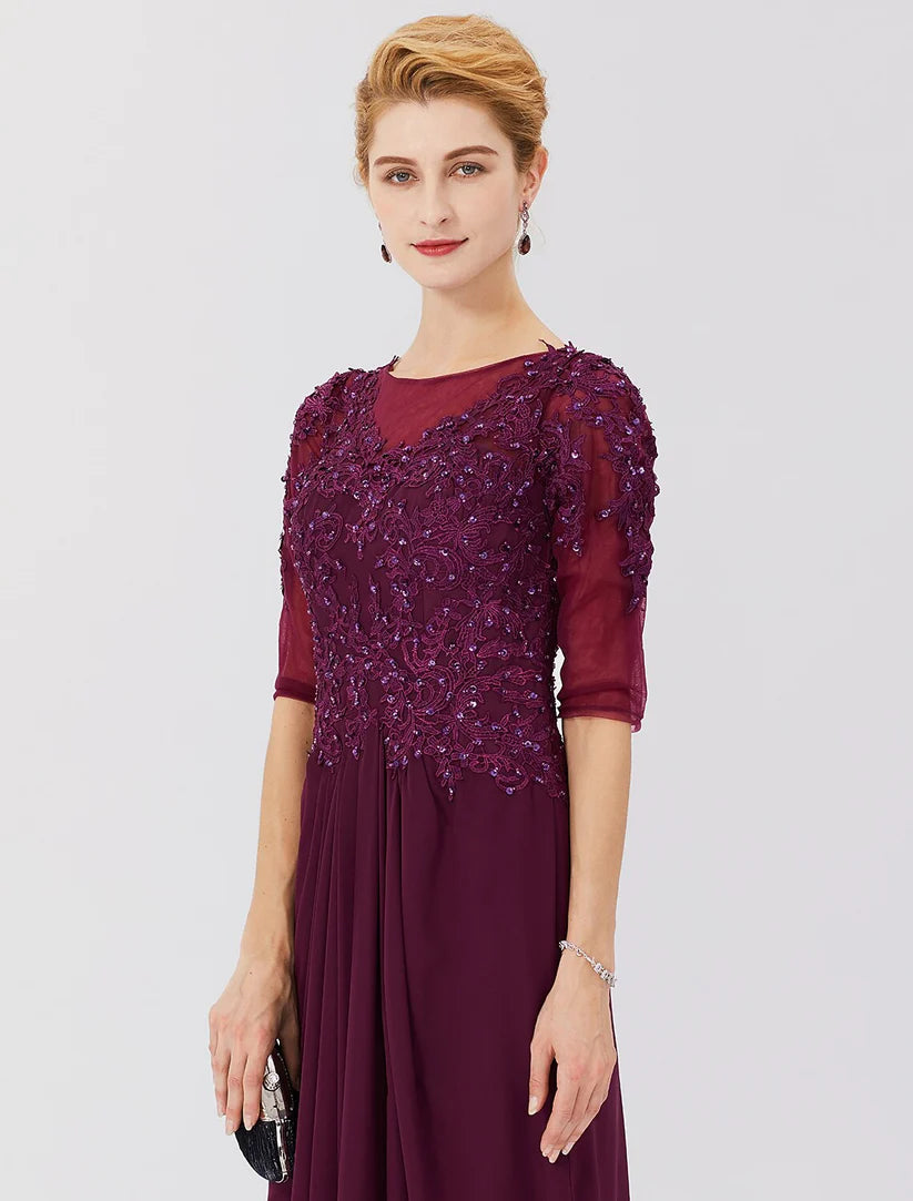 Elegant Sheath Mother of the Bride dress with beaded lace and illusion neckline.