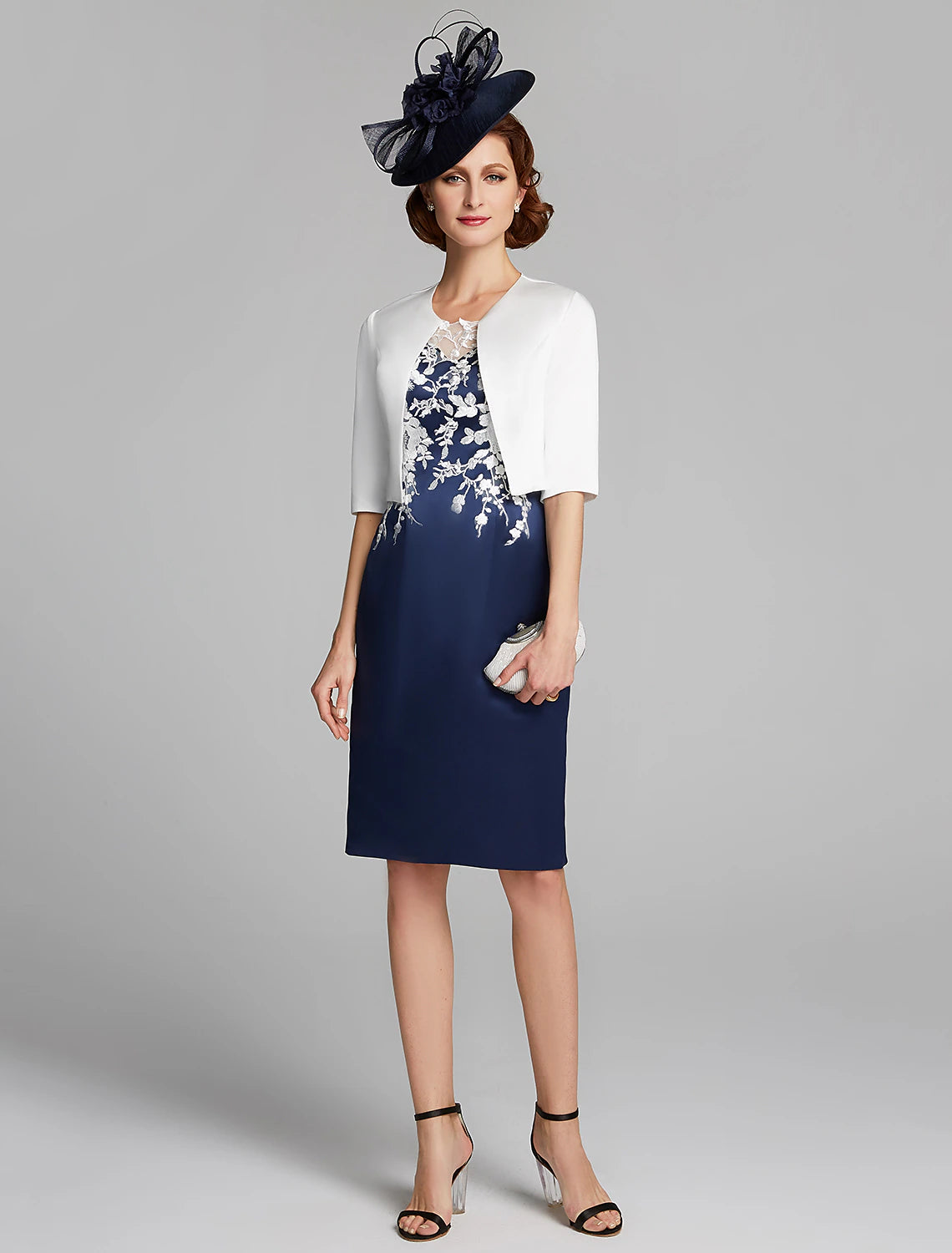 Elegant Mother of the Bride dress with jewel neck and lace appliques.