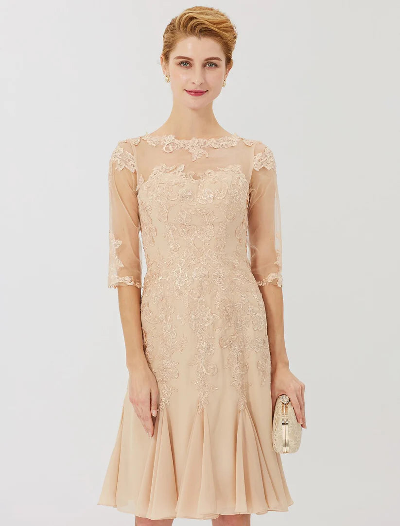 Side profile of a woman in a formal knee-length Mother of the Bride dress.