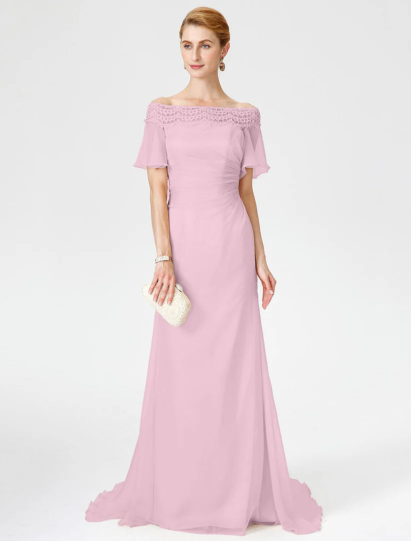 Close-up of the off-shoulder neckline and lace detail on the elegant dress.