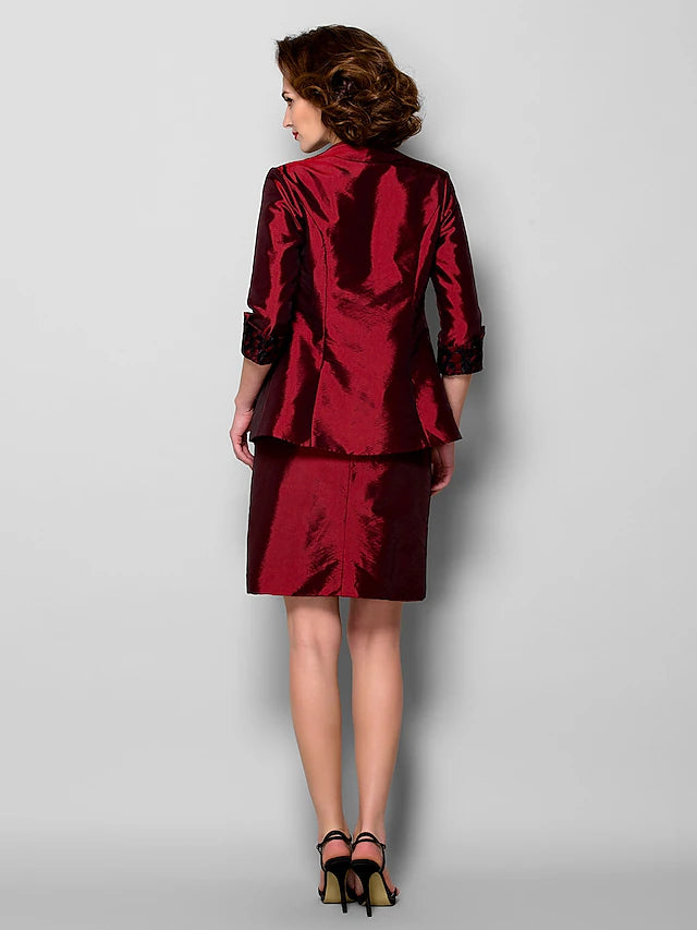 Flowing silhouette of the sheath Mother of the Bride dress.