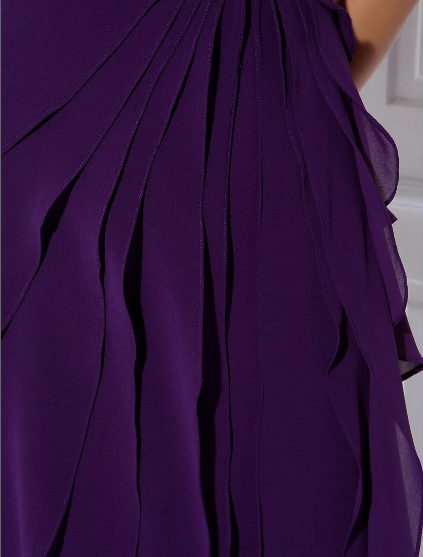 Model posing in the V-neck Mother of the Bride dress for a formal event.
