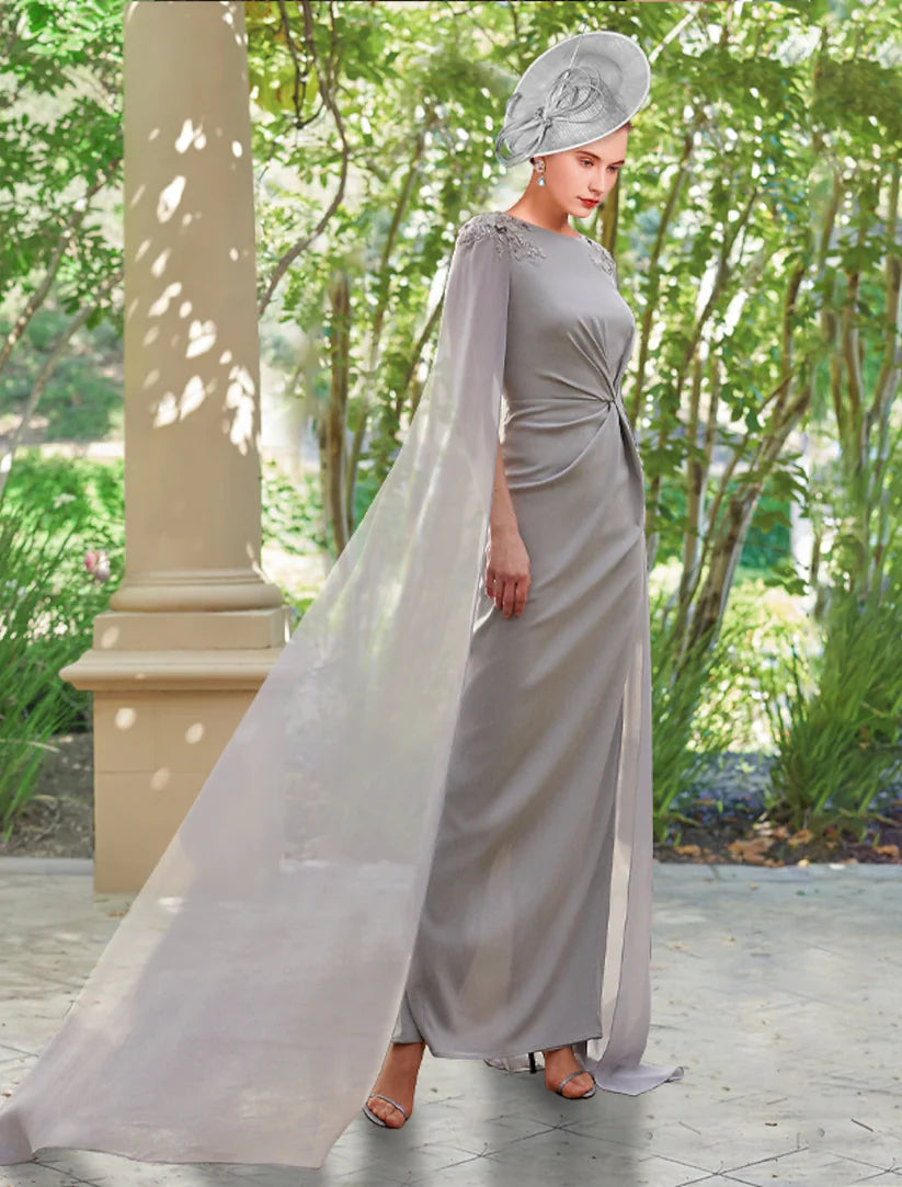 Woman wearing an elegant V-neck long sleeve sheath Mother of the Bride dress with appliques and ruching.