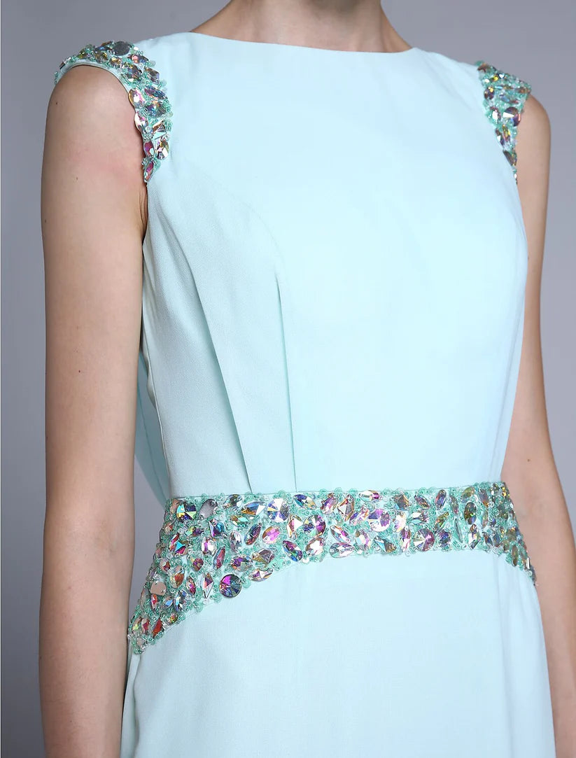 Elegant sheath Mother of the Bride dress in blue-grey chiffon with bateau neck and crystal details.