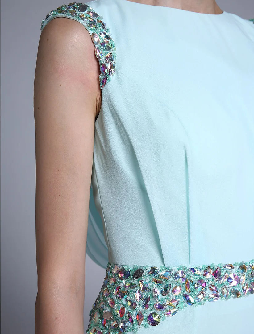 Elegant sheath Mother of the Bride dress in blue-grey chiffon with bateau neck and crystal details.