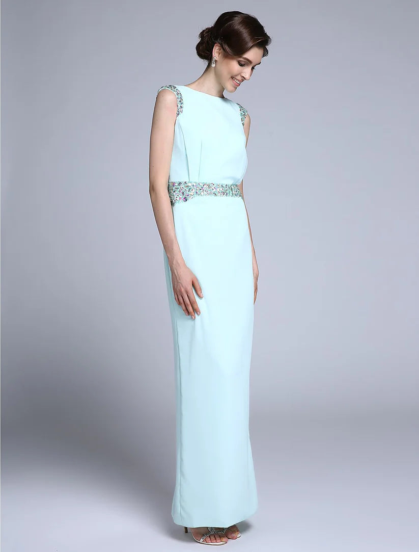 Elegant sheath Mother of the Bride dress in blue-grey chiffon with bateau neck and crystal details.