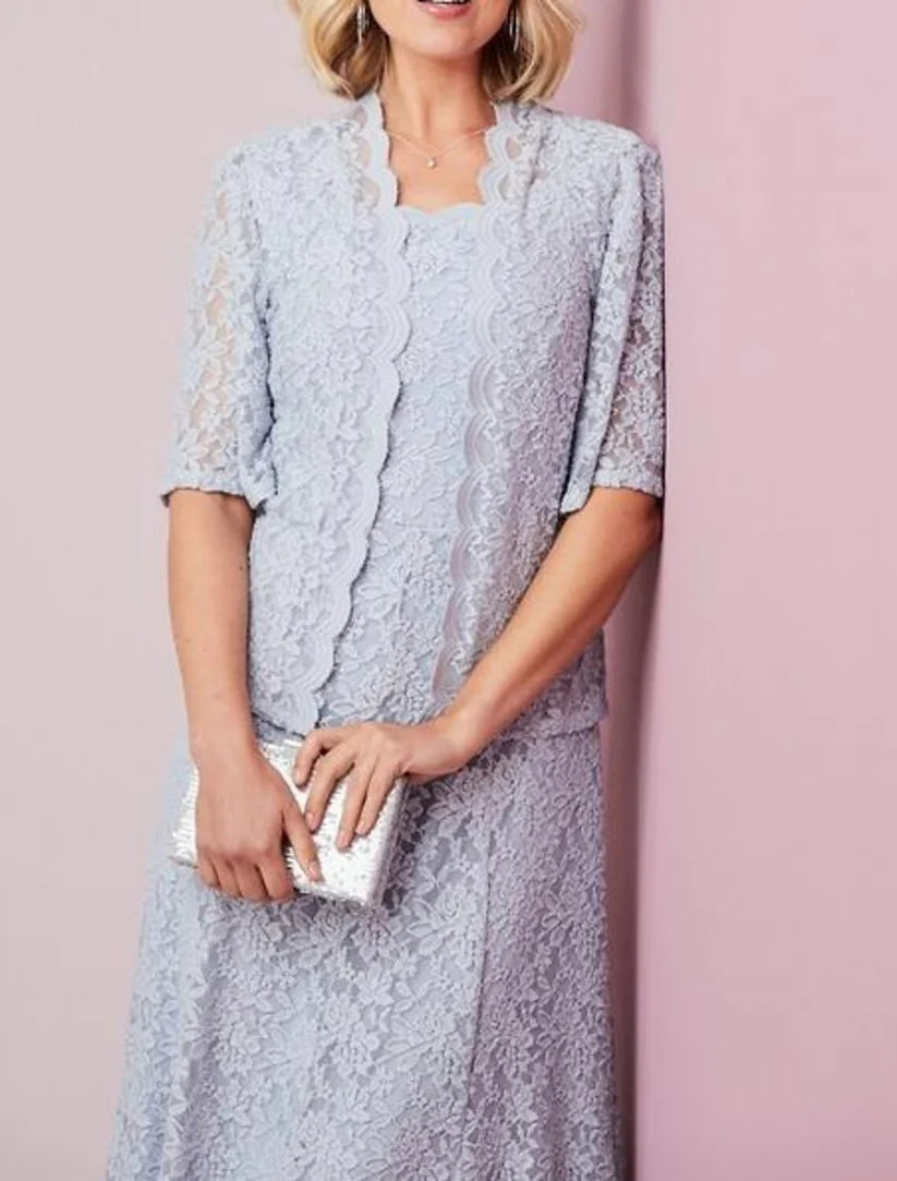 Close-up of the scalloped neckline and chiffon lace half sleeves on the elegant mother of the bride dress.