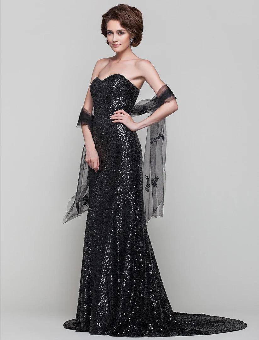Close-up of sequin detailing on a formal gown.