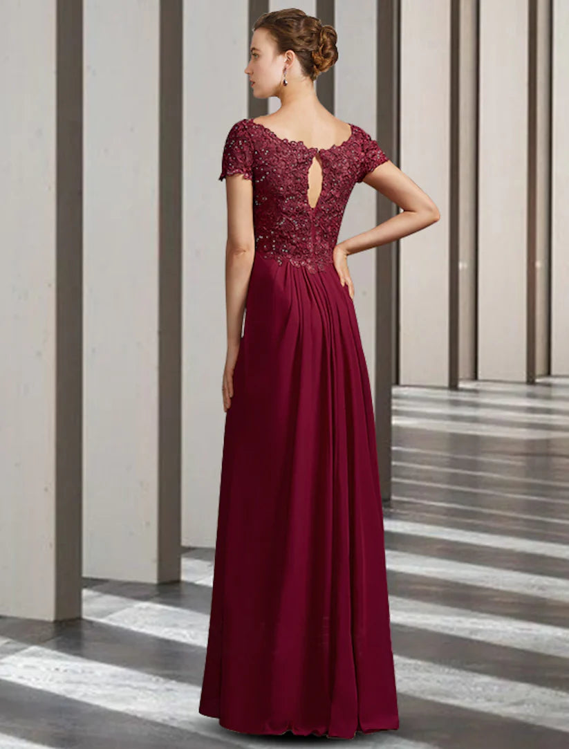 Close-up of the V-neck and lace appliques on the Mother of the Bride dress.