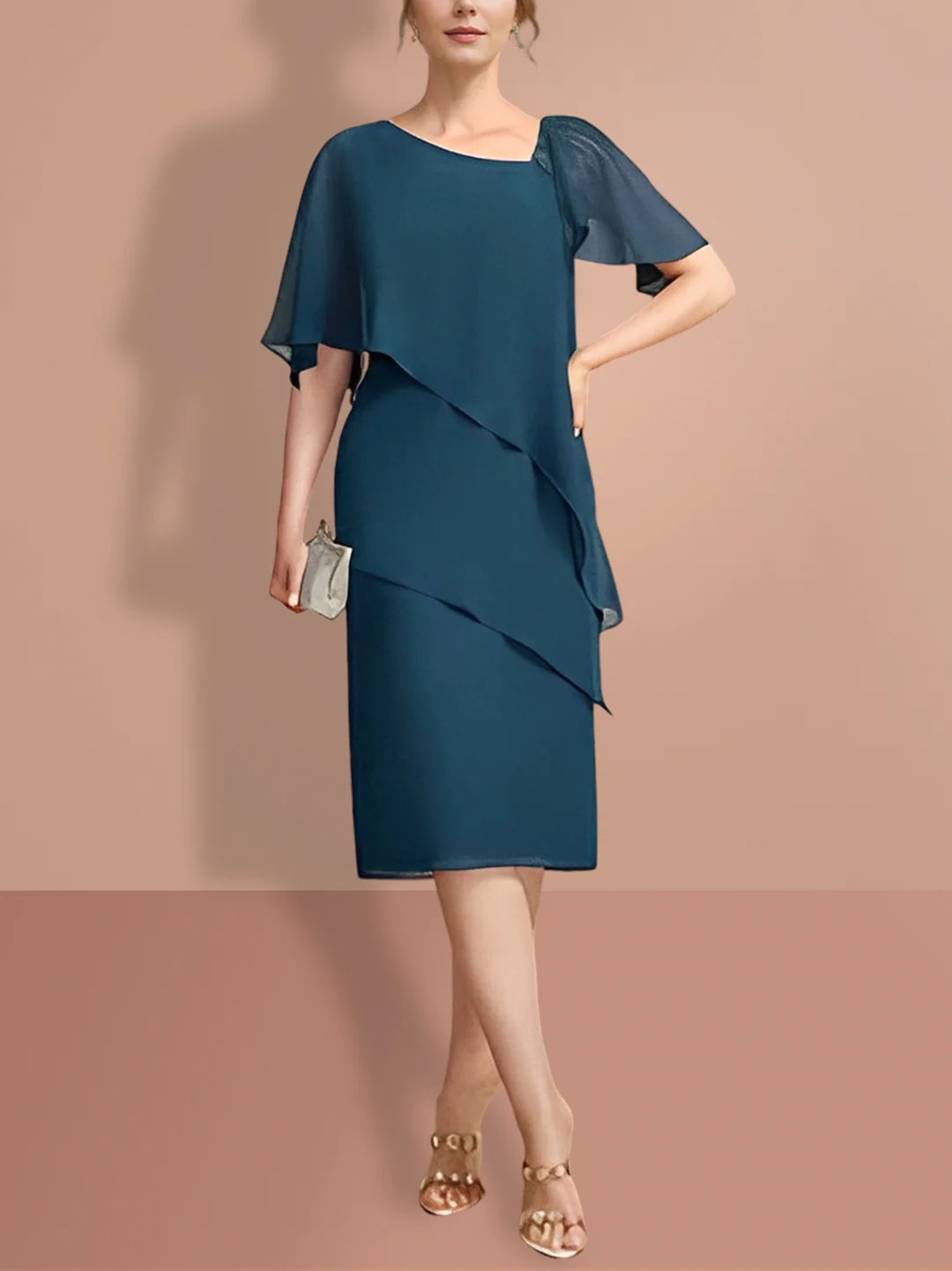 Woman wearing an elegant dark blue sheath mother of the bride gown with short sleeves.