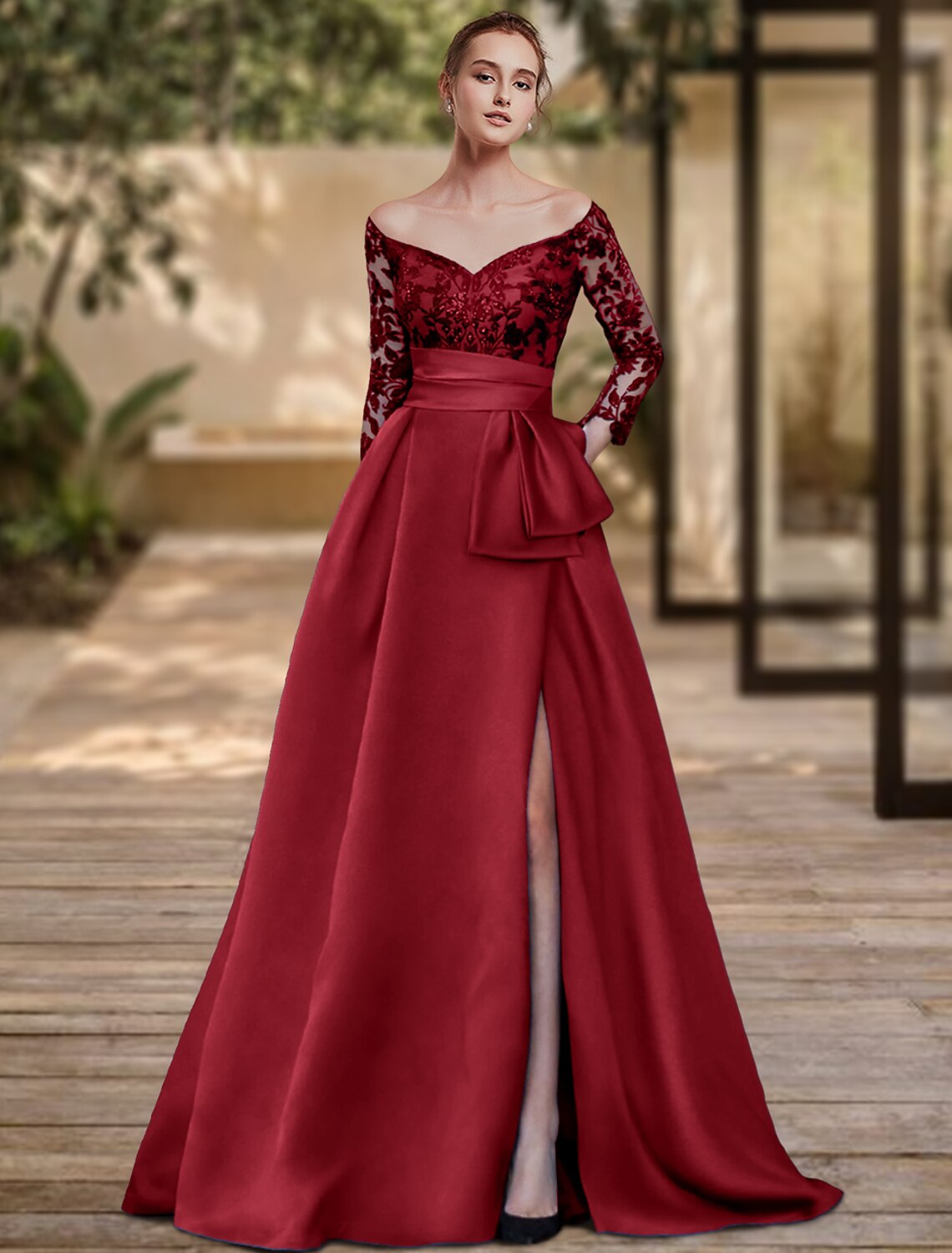 Close-up of the off-shoulder neckline and 3/4 sleeves of the formal dress.