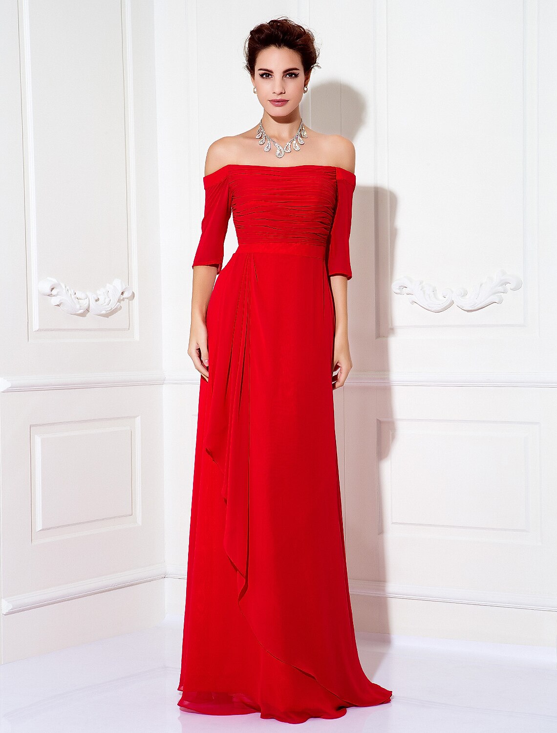 Model wearing an elegant off-shoulder sheath chiffon dress with ruched draping and a sweep train.