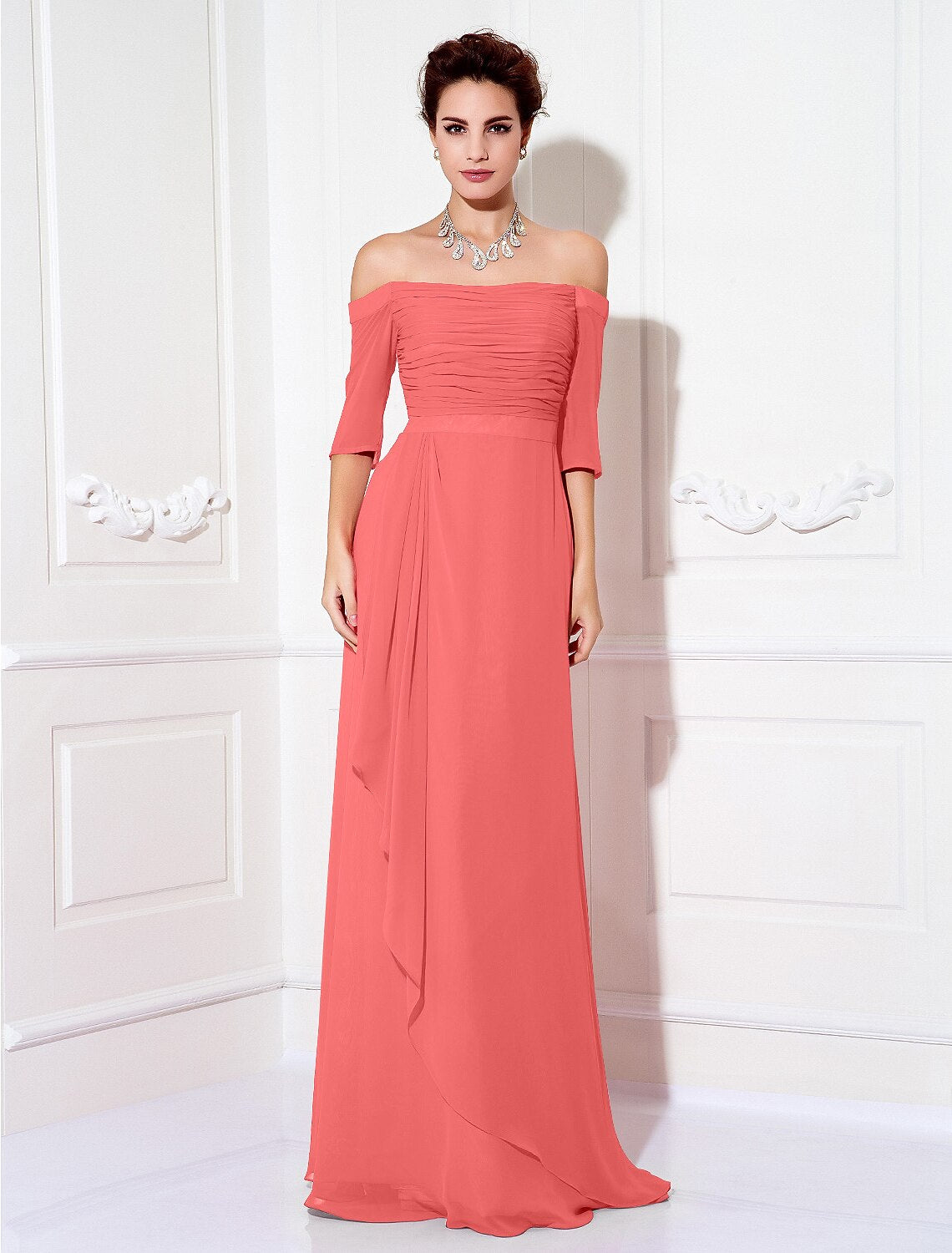Back view of the off-shoulder sheath dress, highlighting the sweep train and ruched details.