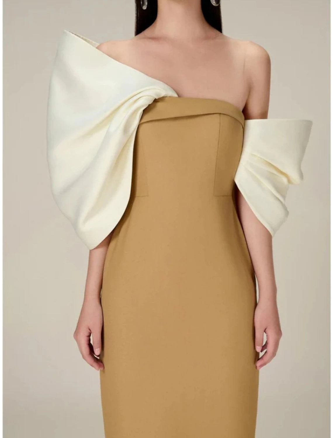 Full length view of the elegant tea length dress, suitable for formal events.