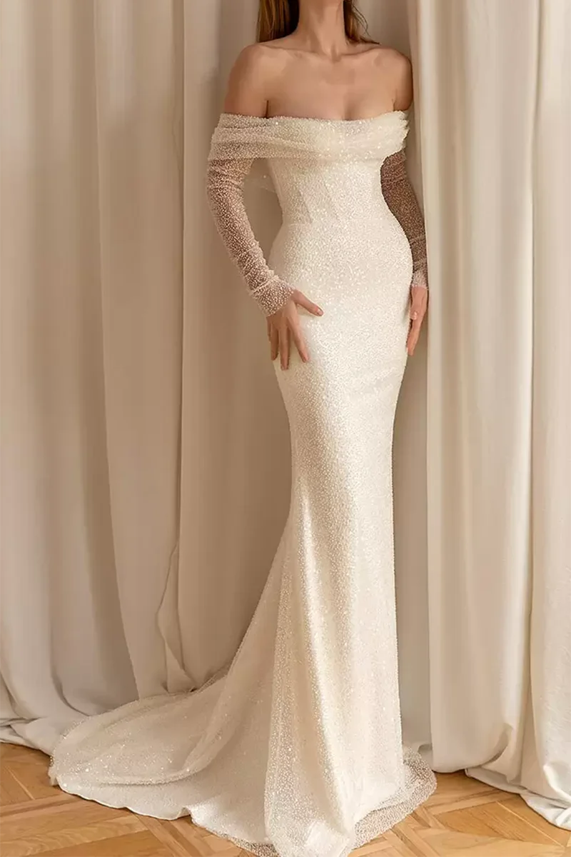 Elegant sheath wedding dress with off-shoulder neckline and long sleeves.