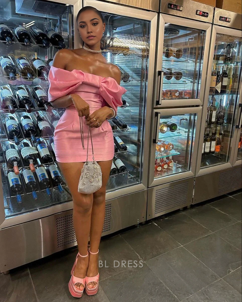 Elegant pink off-shoulder sheath maxi dress.