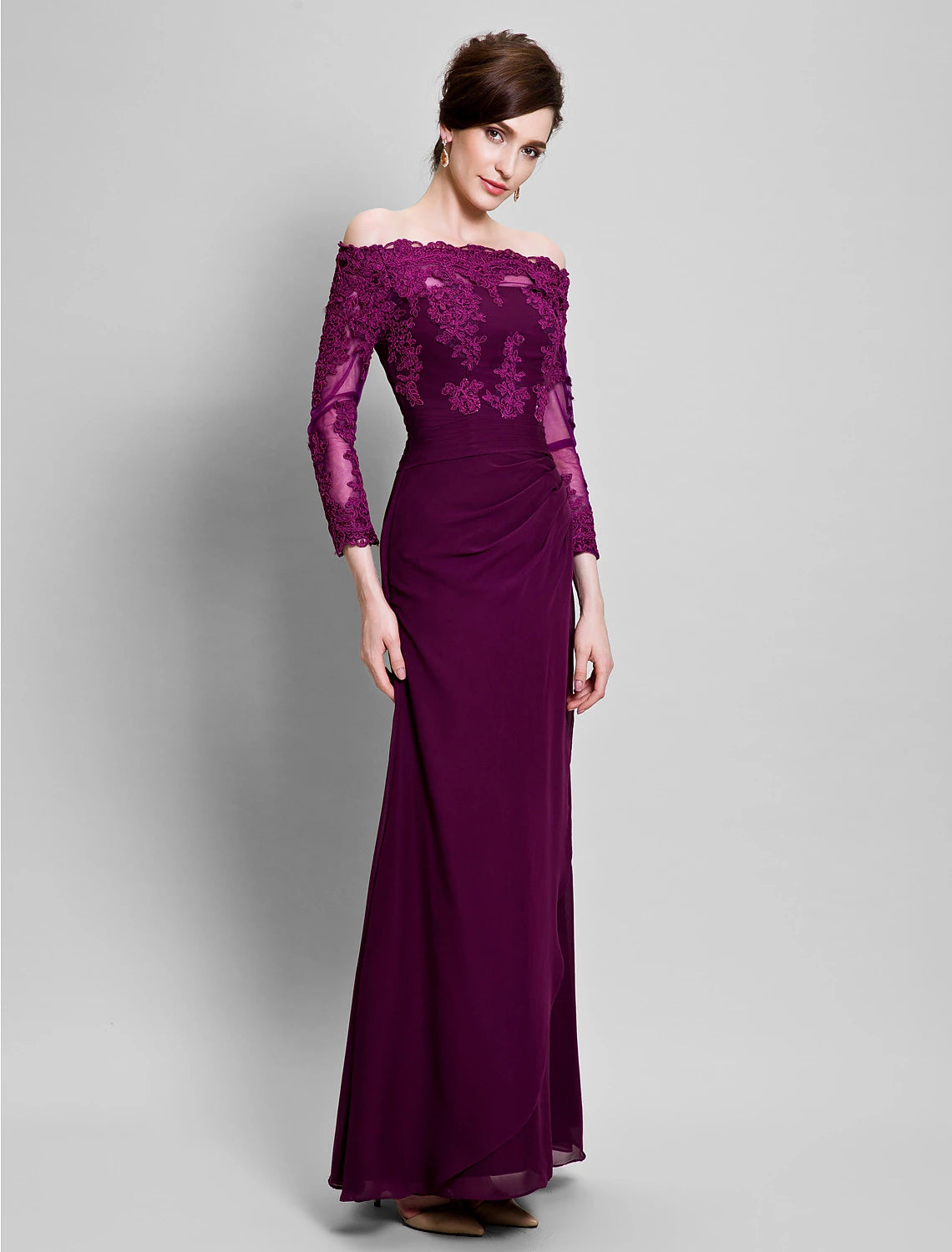 Side view of a woman wearing a sophisticated off-shoulder sheath dress.